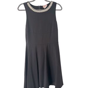 Love…ady fit and flat pearl neckline little black dress